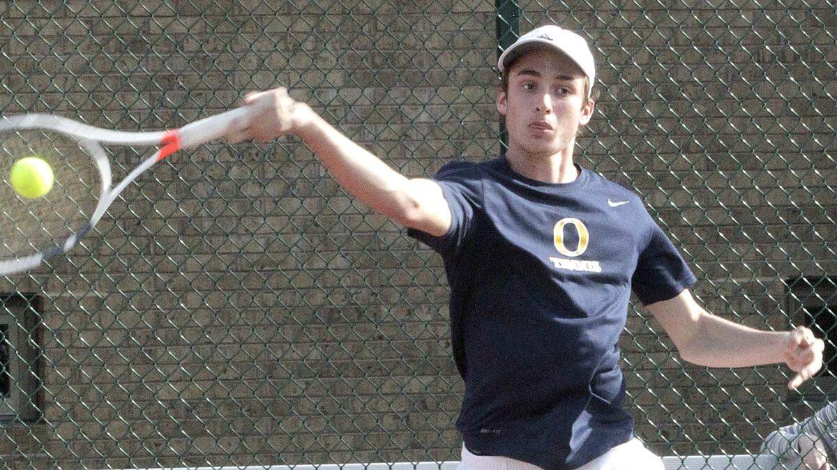 Dominic Macaluso signed his national letter of intent on April 11 to play college tennis at Xavier University. Later in the same afternoon, he handily won his singles and doubles games in a match at Collinsville.