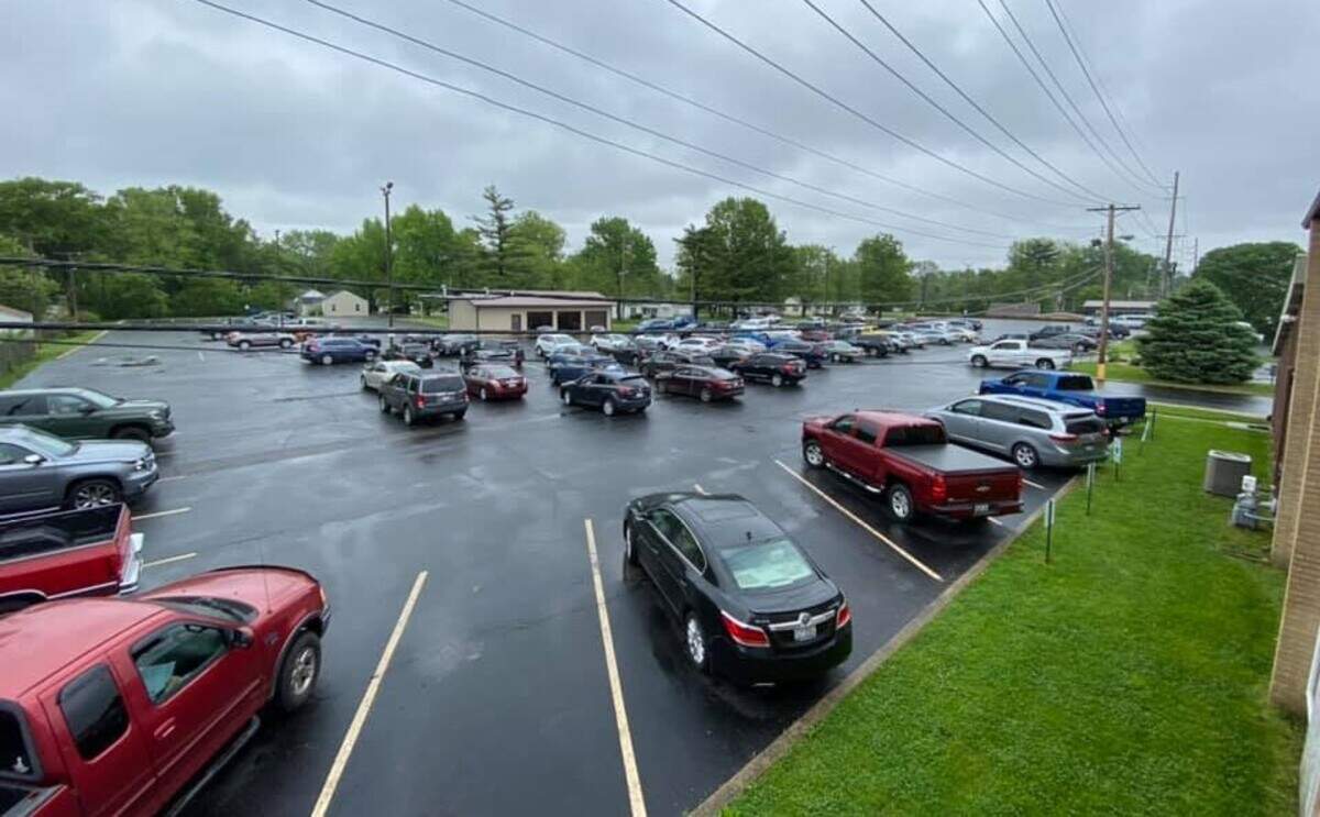 First Baptist Church in Fairview Heights started holding drive-in worship services on Sunday with the pastor and other staff broadcasting from a garage.