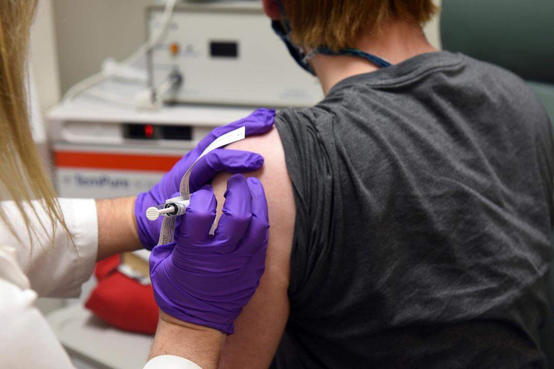 This May 4 file photo shows the first patient enrolled in a clinical trial at University of Maryland School of Medicine in Baltimore for a COVID-19 vaccine candidate being developed by Pfizer and BioNTech.