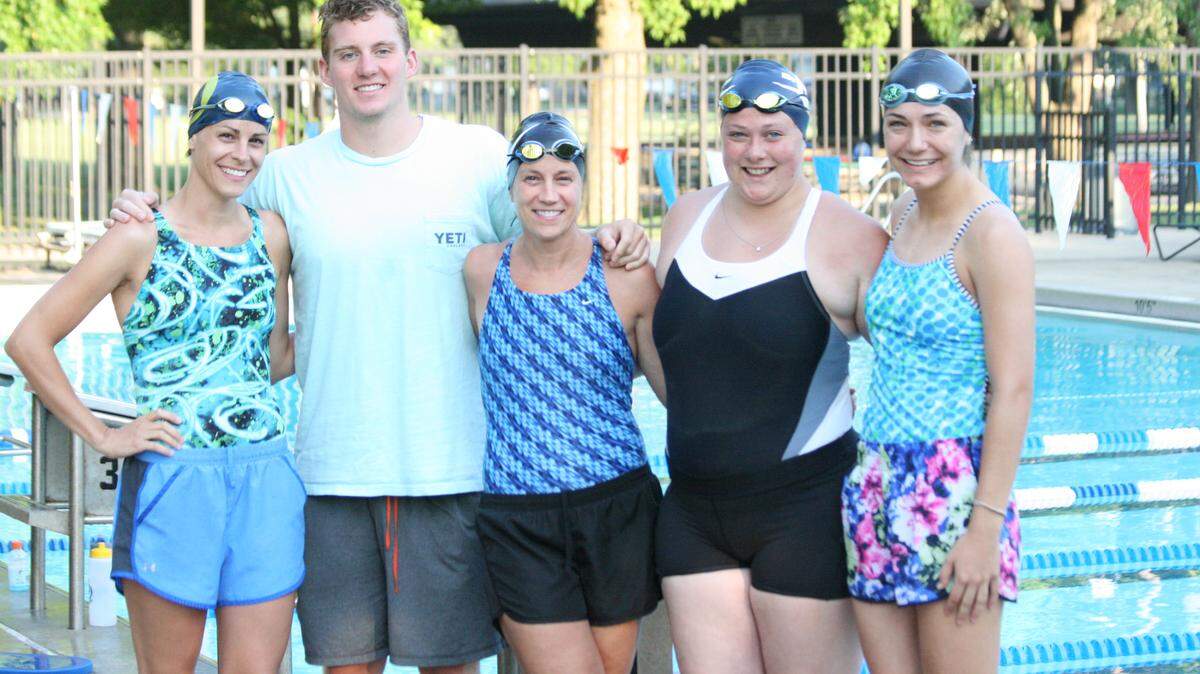 Breakers coaches competed in multiple 50-meter butterfly events in support of the team’s fundraiser for Cystic Fibrosis. Pictured, from left, are head coach Kim Eddy and assistants Max Gibbs, Jessica Hattan, Killara Williamson, and Katie Slaughter.