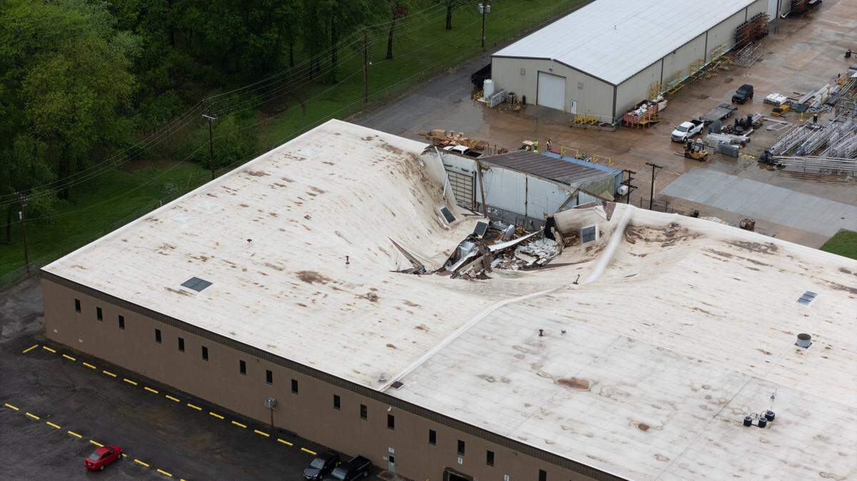 Drone photograph showing a caved-in roof at a factory in Red Bud, Ill. on Tuesday.
