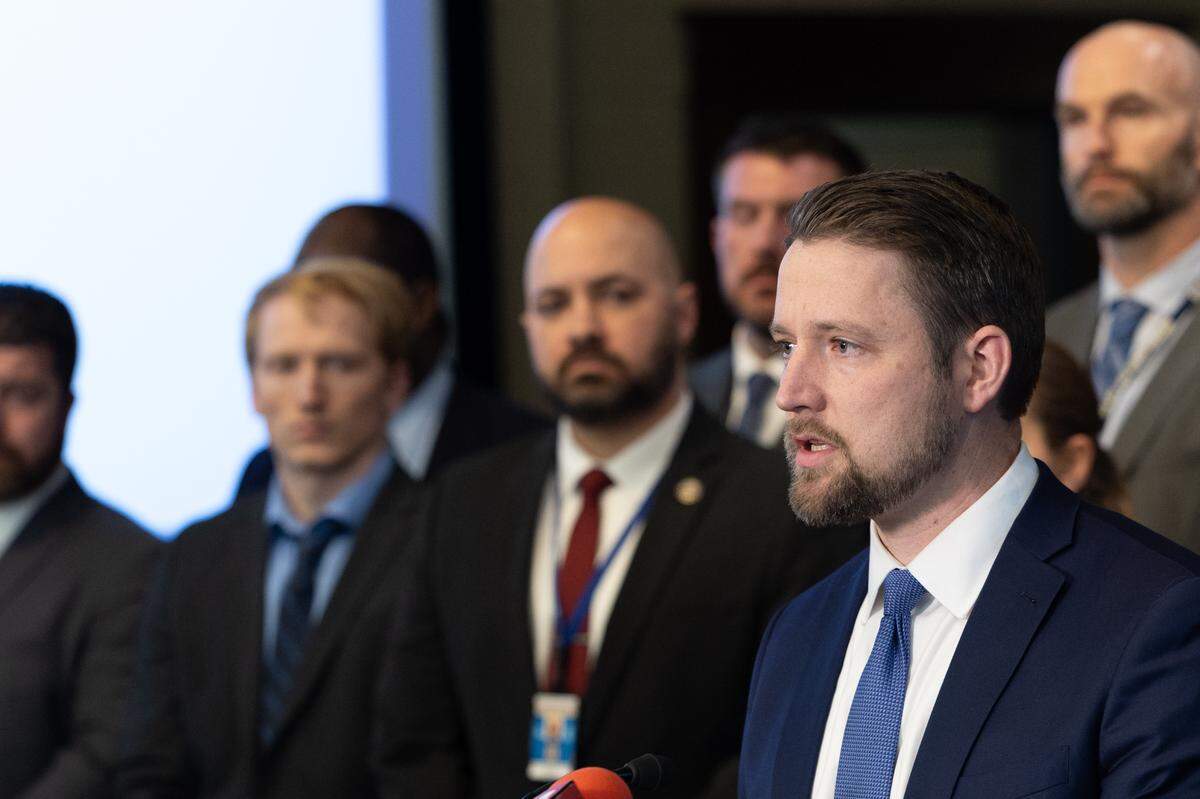 Madison County State’s Attorney Tom Haine speaks during a press conference on Monday at Collinsville City Hall regarding the recent arrest of three suspects in connection with the murder of Portia Rowland.