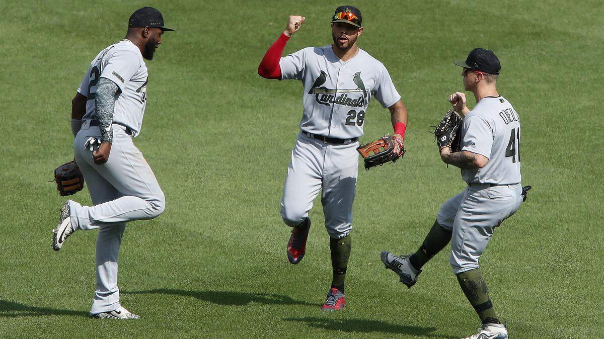 St. Louis Cardinals outfielders Marcell Ozuna Tommy Pham and Tyler O'Neill celebrate Sunday's win. Hopefully, that comeback sparks a hot streak.