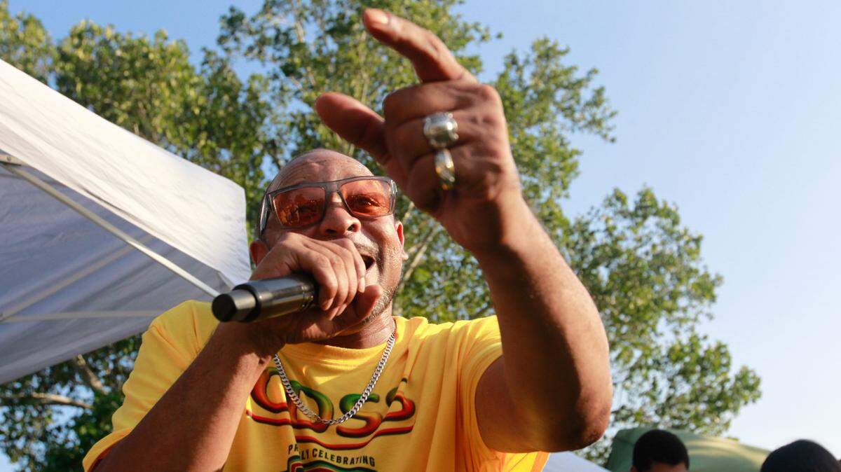 Terrance Taylor addresses the crowd at East St. Louis’s National Night Out on Aug. 1, 2023. Taylor is the vice president of Community Development Sustainable Solutions, a local nonprofit that provides mutual aid to residents of the metro-east region. “Everybody was just joyous to be here,” Taylor said, “you can feel it.”
