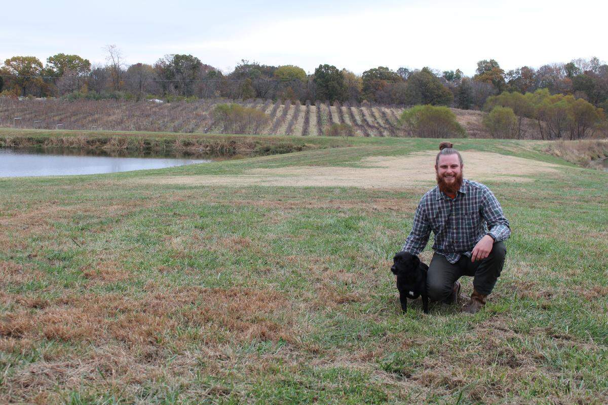 Matt Gorazd poses with his dog Remi at Bella Vista Winery, which is expected to open by the first of the year on 50 acres on the outskirts of Maryville.