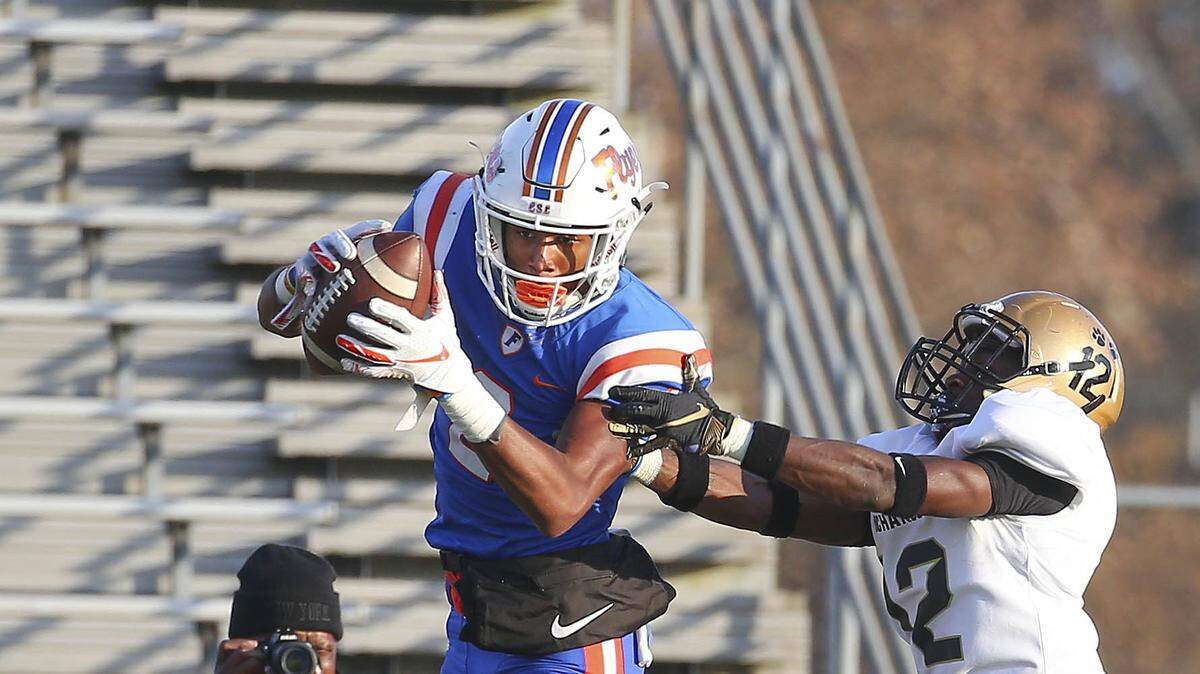 East St. Louis’ Antonio Johnson hauls down a pass during an IHSA Class 6A quarterfinal game against Oak Lawn Richards in 2019. Johnson is now gearing up for the NFL draft, which starts Thursday, April 27.