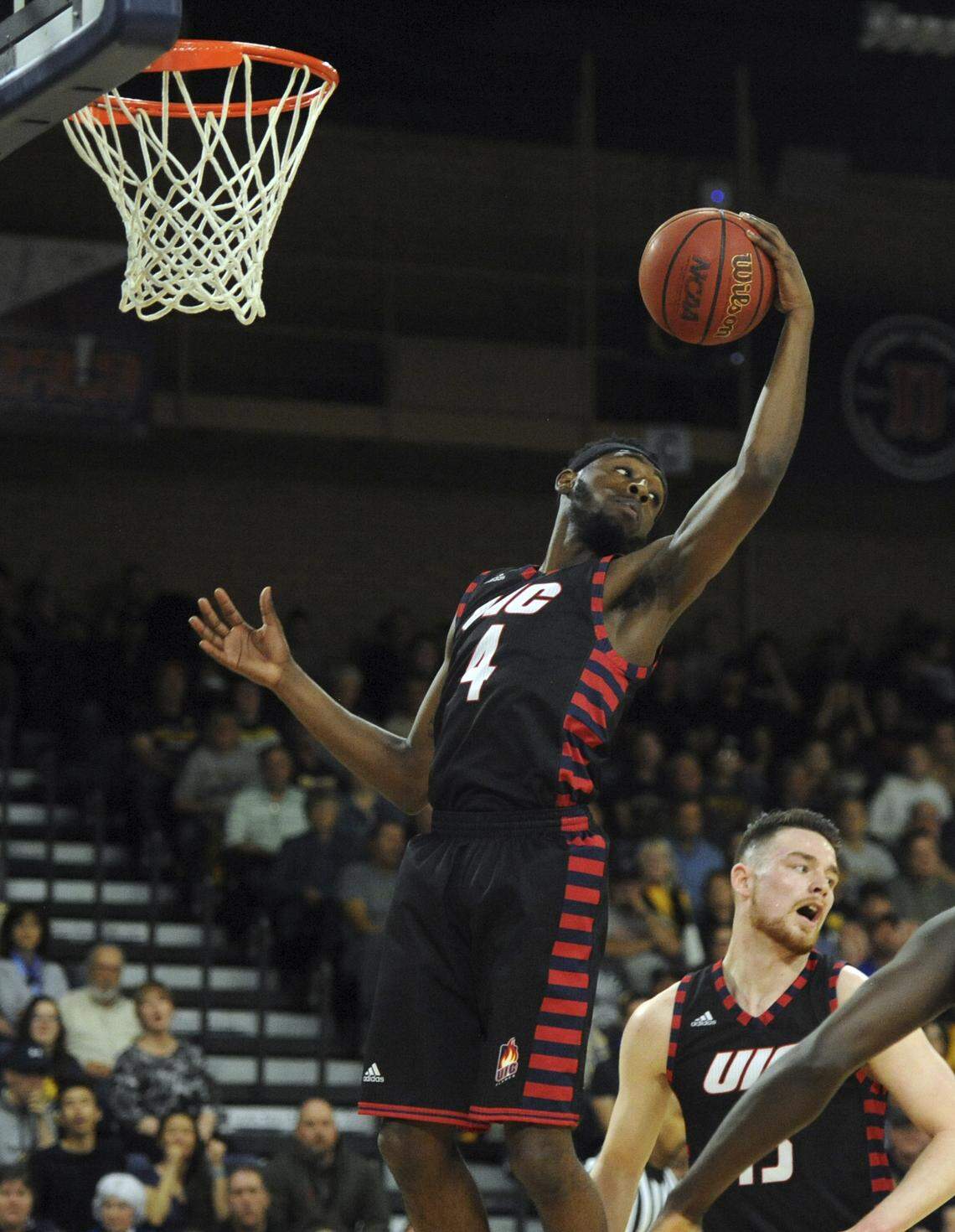 Illinois Chicago’s Tarkus Ferguson jumps to get a rebound during NCAA college basketball game against the Northern Colorado in the CollegeInsider.com Tournament on Friday, March 30, 2018, in Greeley, Colo. (Joshua Polson/The Greeley Tribune via AP)