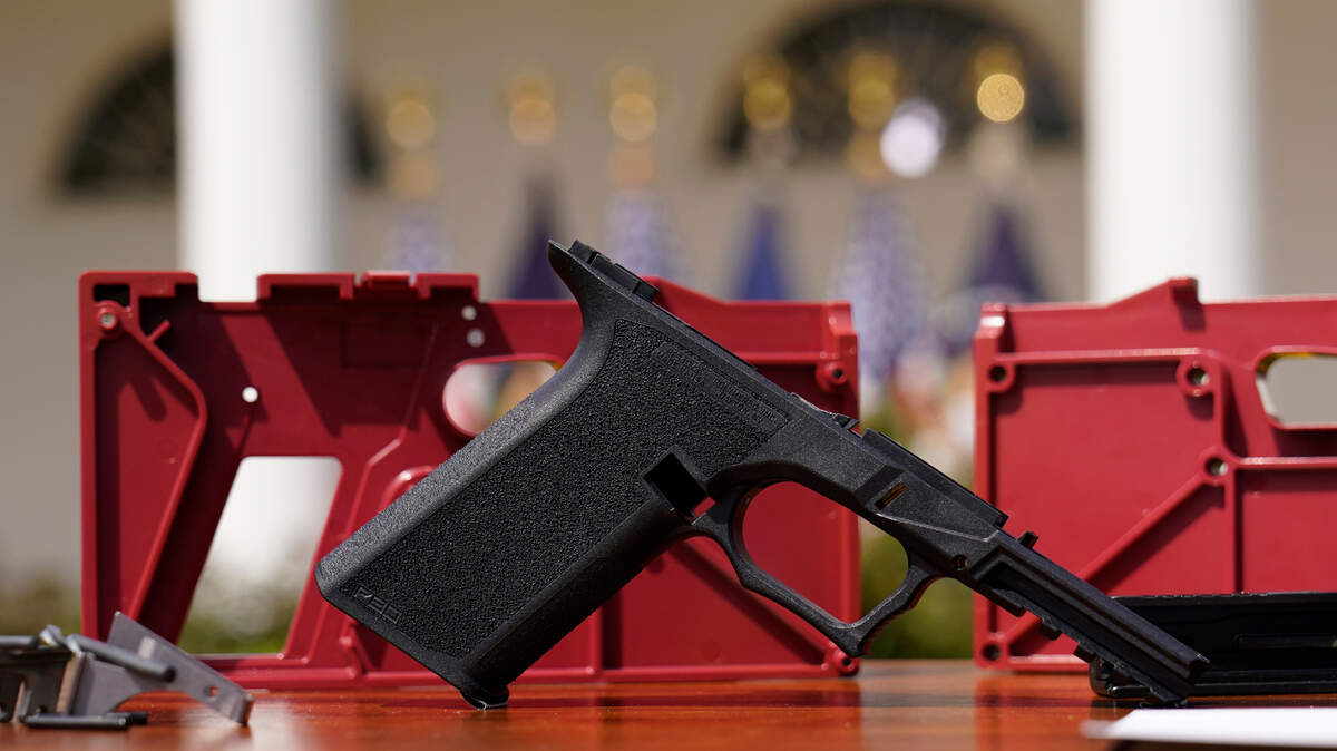 A 9mm pistol build kit with a commercial slide and barrel with a polymer frame is displayed before President Joe Biden and Deputy Attorney General Lisa Monaco speak in the Rose Garden of the White House in Washington, Monday, April 11, 2022, to announces a final version of its ghost gun rule, which comes with the White House and the Justice Department under growing pressure to crack down on gun deaths.. (AP Photo/Carolyn Kaster)