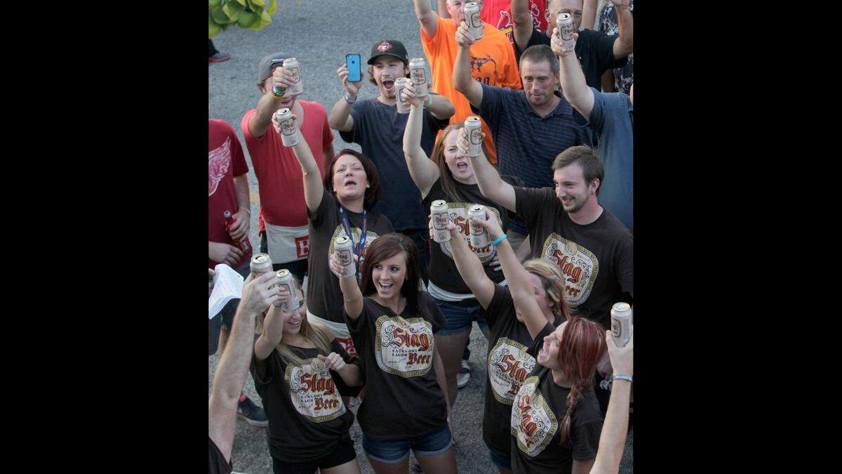 This file photo taken from the roof of the former Pitchers sports bar on West Main Street in Belleville shows customers during a 2014 attempt to stage the world’s largest Stag beer toast.