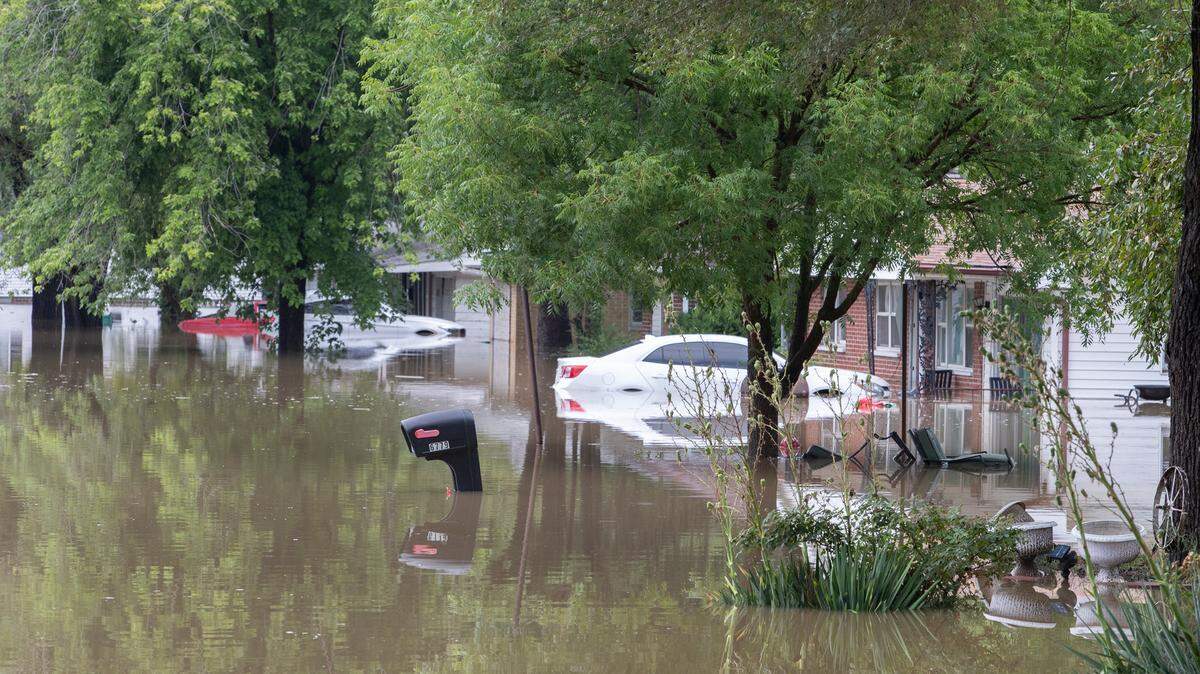 Homes and vehicles in the 6700 block of Mary Ave. in East St. Louis were flooded as water rose quickly in the area near the Harding ditch.