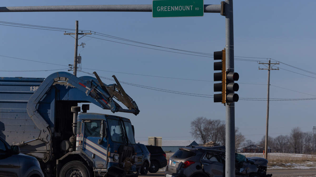 At the scene of a crash involving a garbage truck along Mascoutah Avenue and South Green Mount Road in Belleville, Ill., on Jan. 24, 2025.