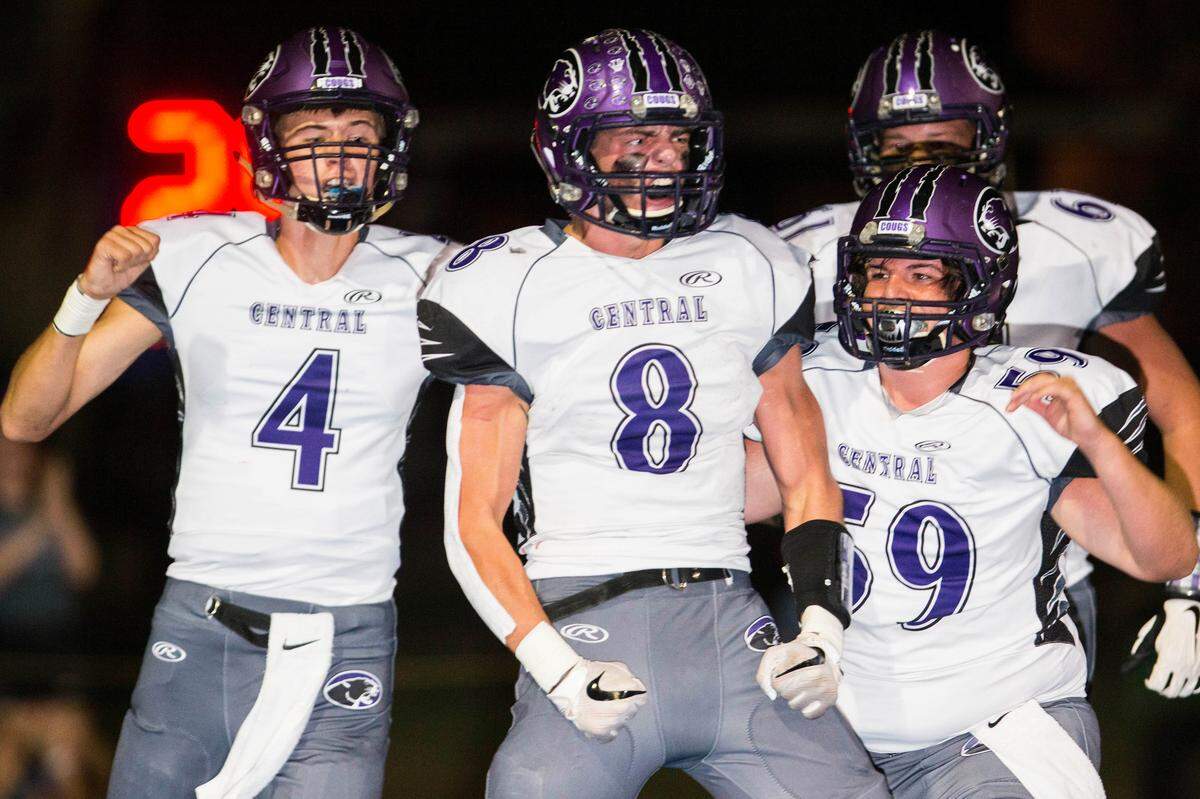 Breese Central’s Tyler Huegen celebrates with teammates after a touchdown run against Mater Dei.
