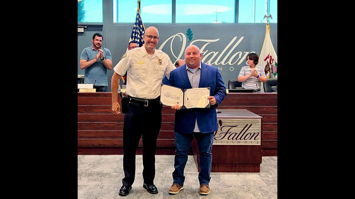Jim Ford was honored with a Community Service Award from the O’Fallon Police Department, presented by Police Chief Kirk Brueggeman.