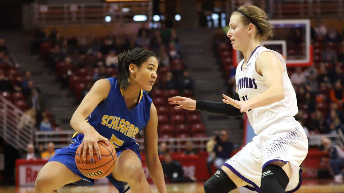 Lebanon junior Emily Reinneck guards Schlarman Academy junior Anaya Peoples during the second half of the IHSA Class 1A state semifinals Friday afternoon at Redbird Arena in Normal.