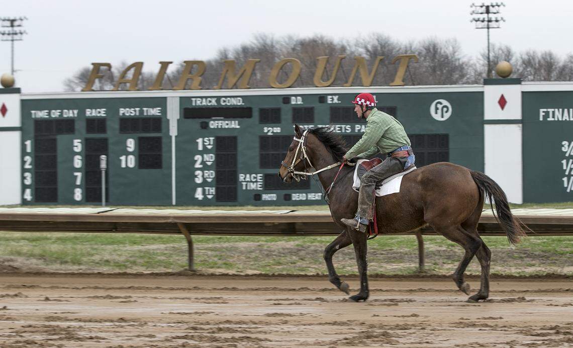 A trainer works out a horse at Fairmount Park racetrack in Collinsville. The track is due to get sports betting and video gambling as part of a gaming expansion bill that passed in the most recent session of the Legislature.