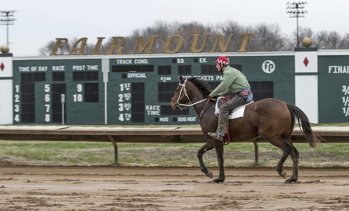 A trainer prepares for the upcoming race season at Fairmount Park. The season starts on April 16. The racetrack is continuing to ask the legislature for an additional revenue source to help fund purses and attract more horses to the track.