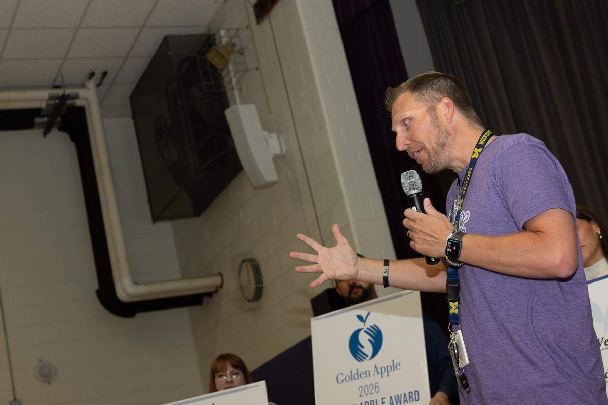 Joshua&nbsp;Veath, a fifth-grade teacher at Mascoutah Elementary, gives a speech thanking God, his family, his students and coworkers after receiving the Golden Apple Excellence in Teaching Award.