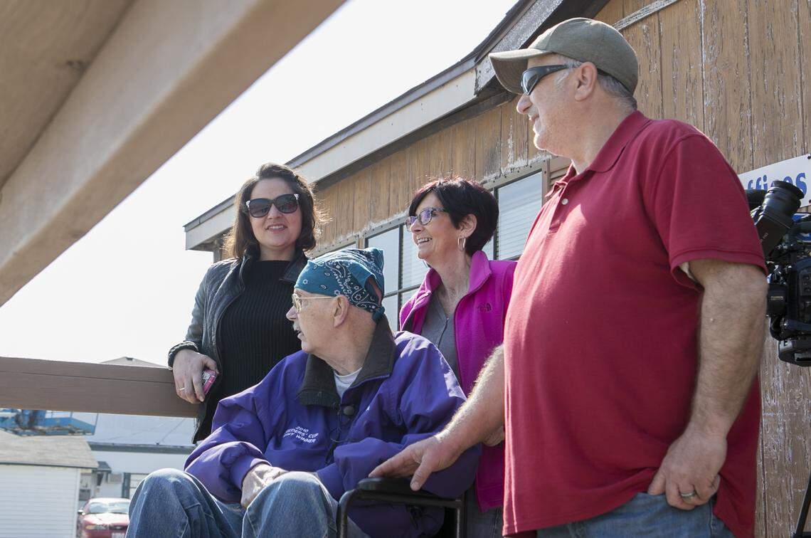 Christine Ellis-Randazzo, John Brown, Phyllis Brown and Teddy Randazzo watch John’s favorite horse Dreymore workout on the track.