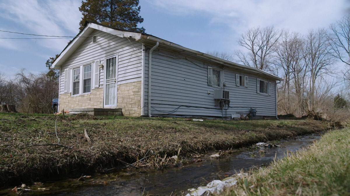 William McNeal, 73, says he doesn’t trust the water at his home in Cahokia Heights, where a ditch surrounding his house flows with smelly water every time there is significant rain.
