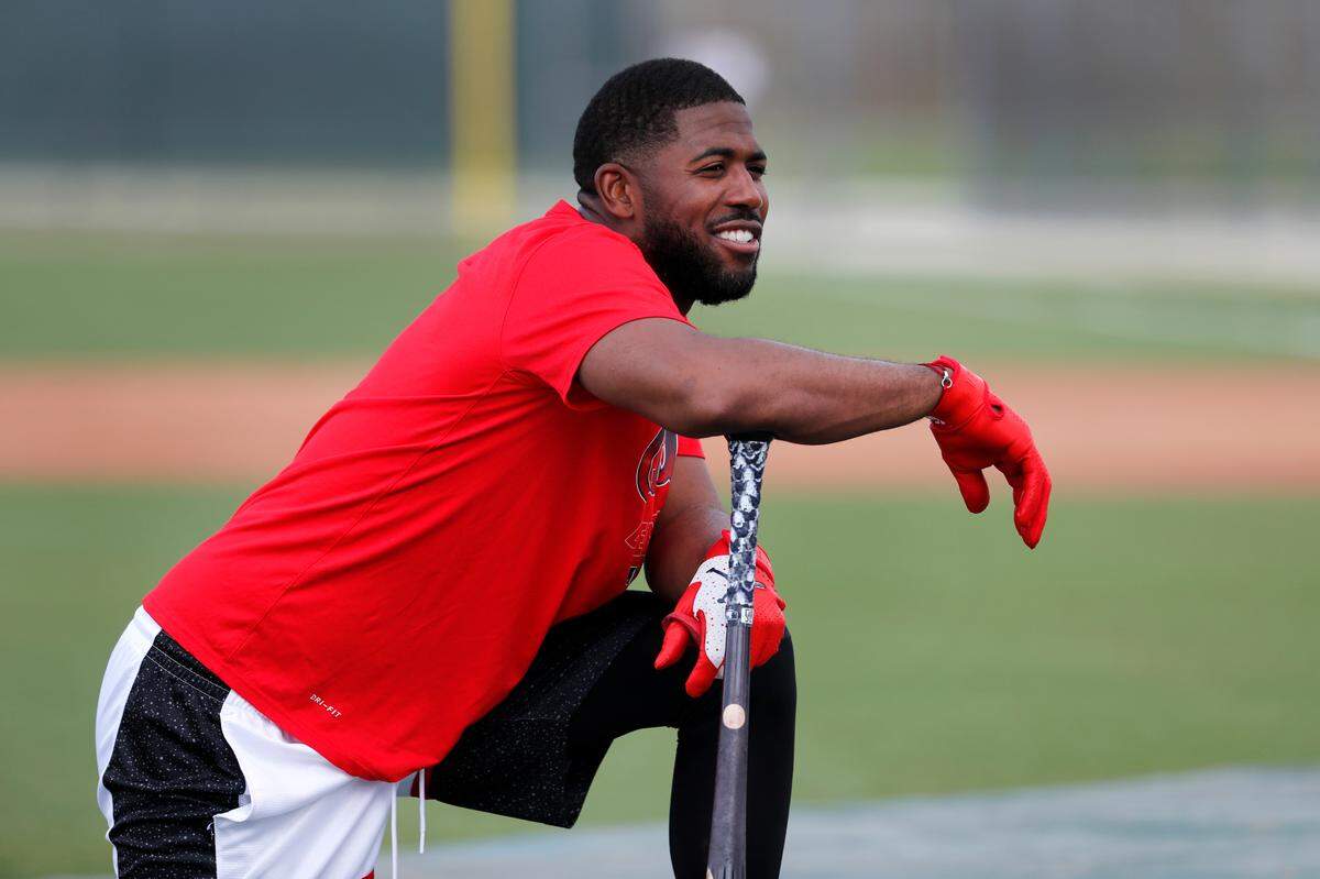 St. Louis Cardinals’ Dexter Fowler waits to take his turn in the batting cage during spring training baseball practice in Jupiter, Fla. (AP Photo/Jeff Roberson)