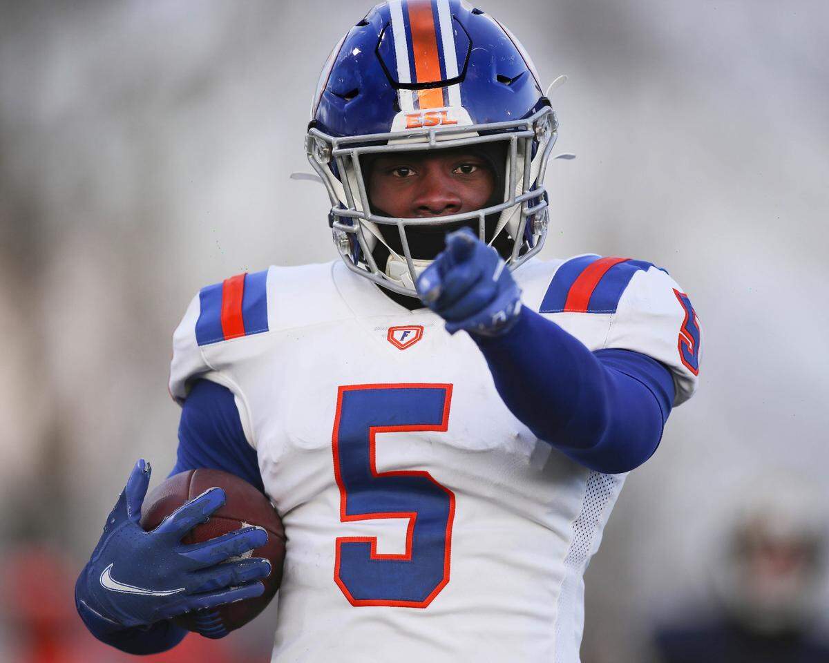 East St. Louis running back Marquise Palmer is laser focused after scoring a touchdown during the IHSA Class 6A semifinals against Lemont. The Flyers’ 32-29 victory sends them into the state championship game against Crystal Lake Prairie Ridge.