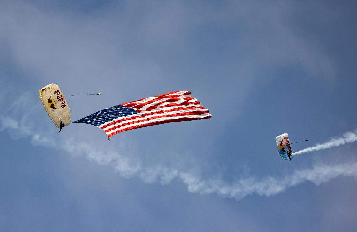 Red Bull sky divers perform at the Scott AFB air show. The event continues all day on Sunday at Scott Air Force Base. For information on the schedule, visit bnd.com.