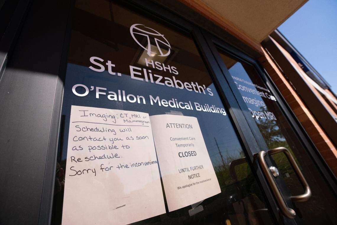 A hand-printed notice informs patients that the Convenient Care Imaging Open MRI Center in the O’Fallon Medical Building affiliated with St. Elizabeth’s Hospital is closed on Friday.