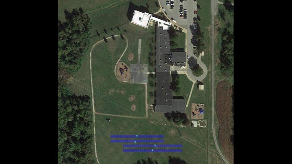 This computer-generated image shows how ground-mounted solar panels will be installed in a field behind Ellis Elementary School in Belleville.