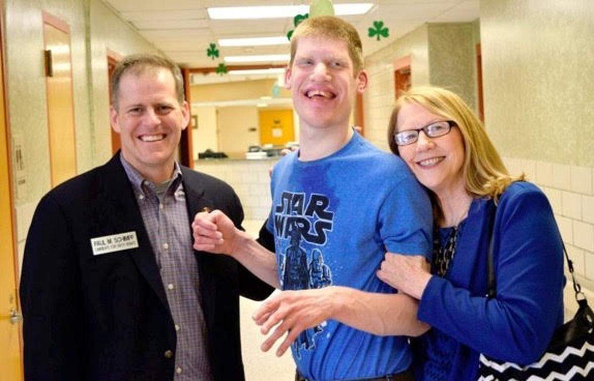 Rita Winkeler, right, is shown with her son, Mark, in 2016, when Illinois State Sen. Paul Schimpf visited Warren G. Murray Developmental Center in Centralia, where Mark lives.