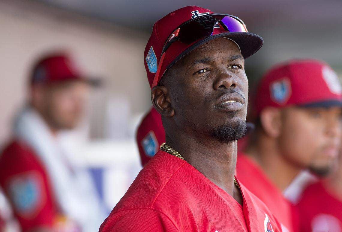 Outfielder Adolis Garcia in the dugout during a spring training game in Jupiter, Florida.