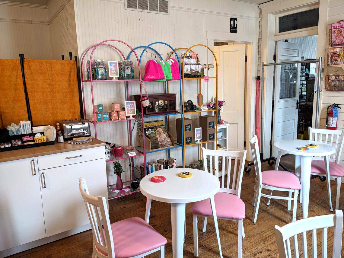 A view of the seating area and merchandise at The Roastery
