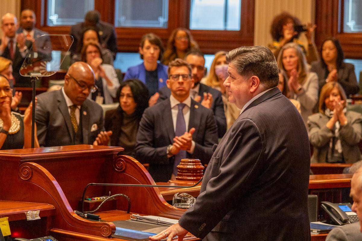Gov. JB Pritzker enters the House chamber on Wednesday, Feb. 19, 2025, for his annual budget address.