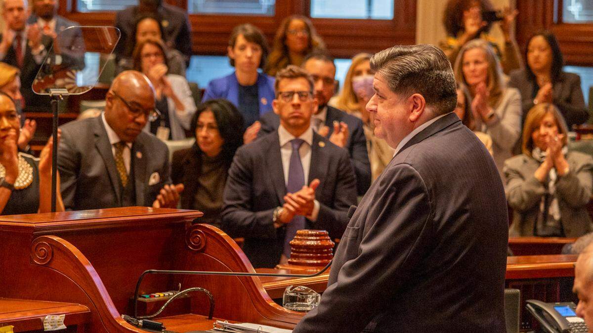 Gov. JB Pritzker enters the House chamber on Wednesday, Feb. 19, 2025, for his annual budget address.