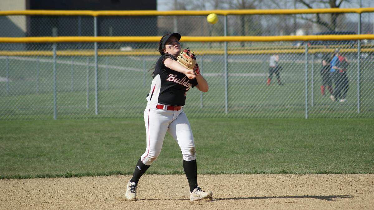 Highland junior shortstop Lily Garbett, shown throwing the ball to first base, slugged a three-run home run in the bottom of the first inning to tie the game and help the Lady Bulldogs score a 5-4 come-from-behind home win over Gillespie on Thursday.