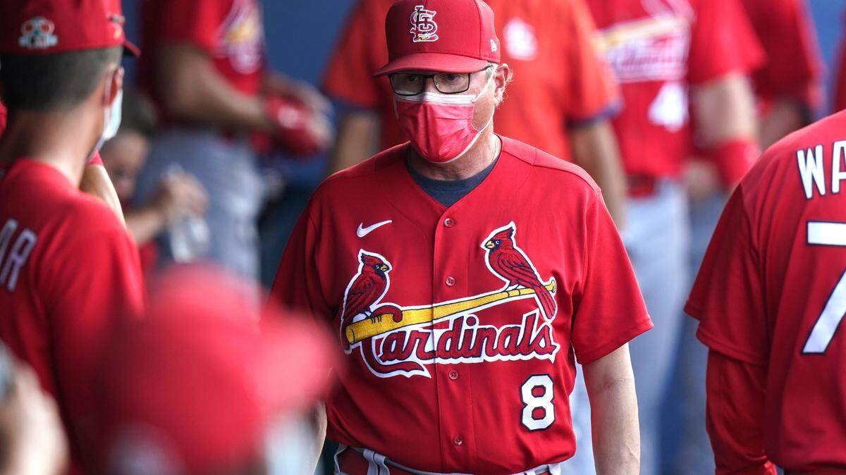 St. Louis Cardinals manager Mike Shildt (8) walks in the dugout during a spring training baseball game against the Houston Astros, Thursday, March 25, 2021, in West Palm Beach, Fla. (AP Photo/Lynne Sladky)