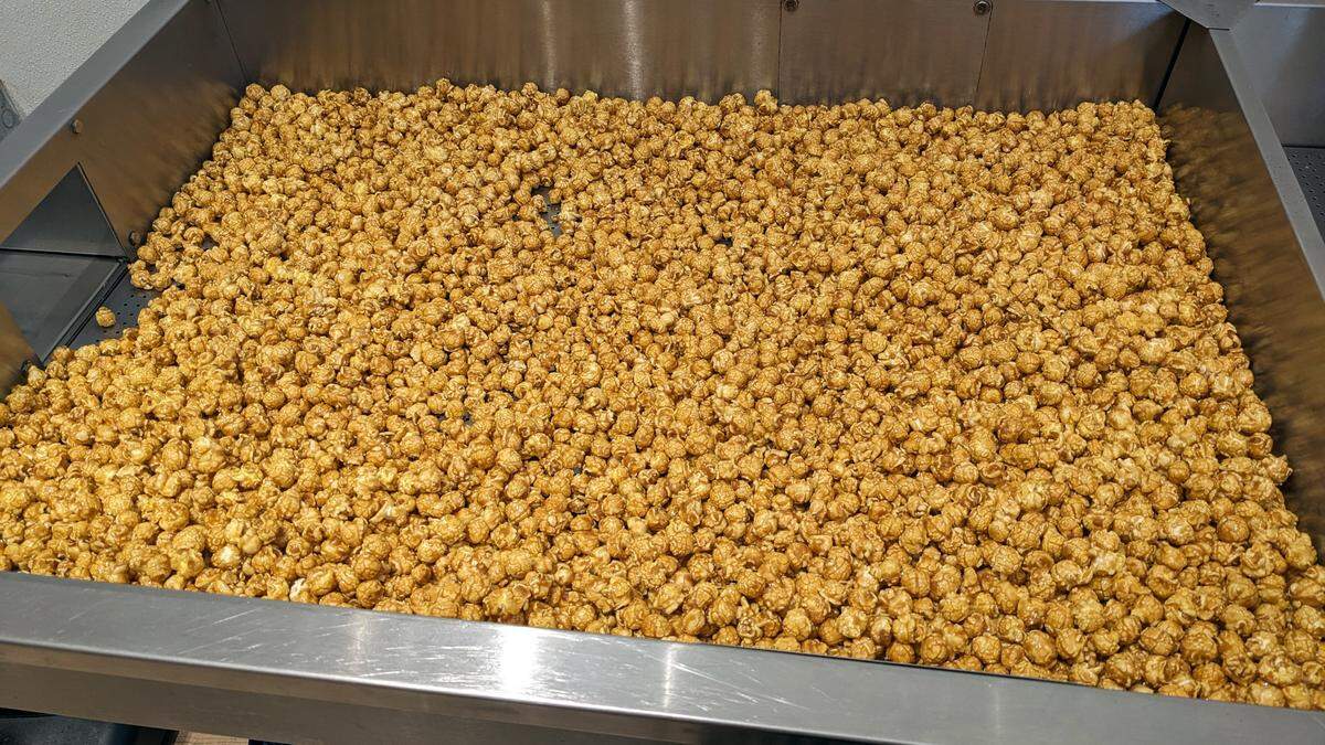 A fresh batch of caramel corn at Abe’s Gourmet Popcorn