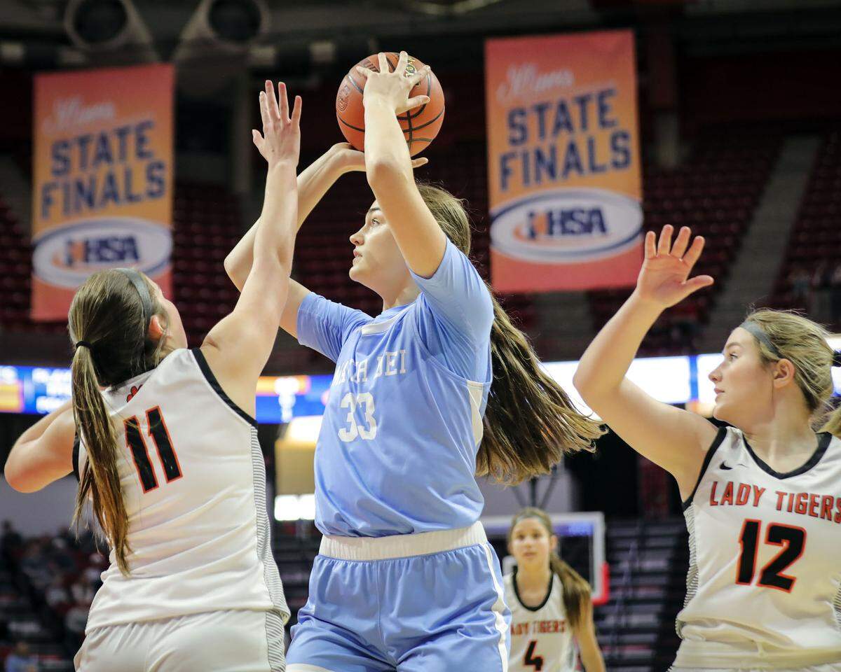 Mater Dei’s Alyssa Koerkenmeier shoots the ball during Saturday’s IHSA Class 2A state championship game at CEFCU Arena (formerly Redbird Arena) on the campus of Illinois State University. Mater Dei ultimately prevailed 62-46 to claim the state title.