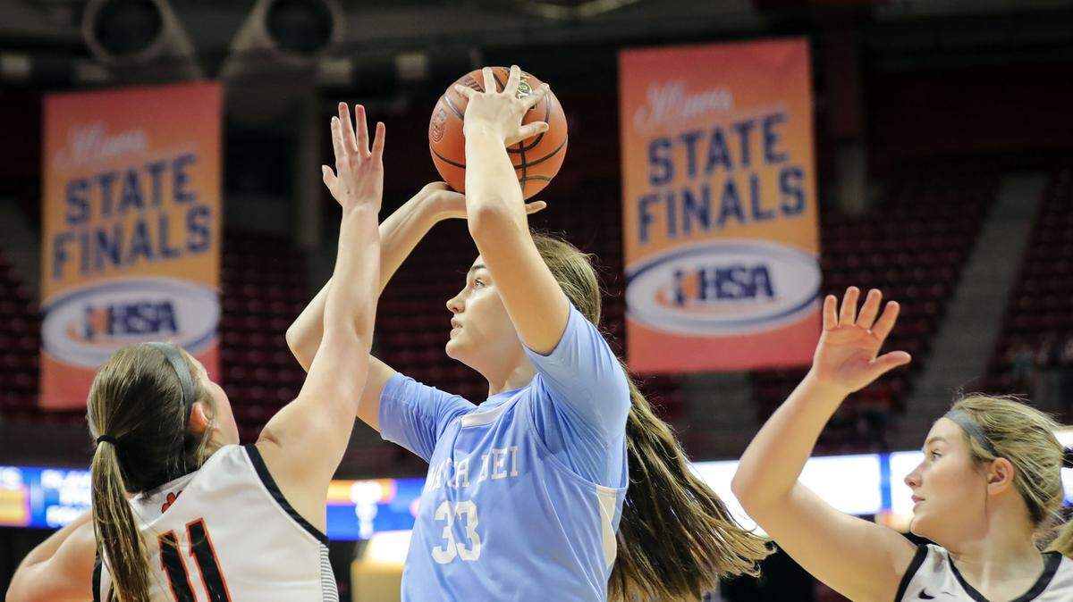 Mater Dei’s Alyssa Koerkenmeier shoots the ball during Saturday’s IHSA Class 2A state championship game at CEFCU Arena (formerly Redbird Arena) on the campus of Illinois State University. Koerkenmeier helped lead the Knights to the state championship with a 62-46 win.