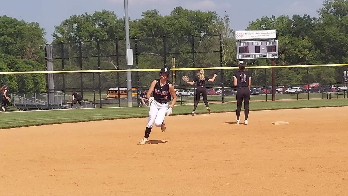 Highland senior infielder Maggie Grohmann rounds second base during the IHSA Class 3A Civic Memorial Regional semifinals against Mascoutah on Tuesday, May 23, at Bethalto Sports Complex. Grohmann helped power the Bulldogs to a 12-2 victory.