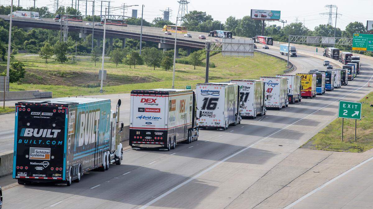 The NASCAR hauler parade makes its way along Interstate 70 in Illinois on its way to downtown St. Louis. The parade is part of the Enjoy Illinois 300 NASCAR Cup Series race festivities this weekend at World Wide Technology Raceway.