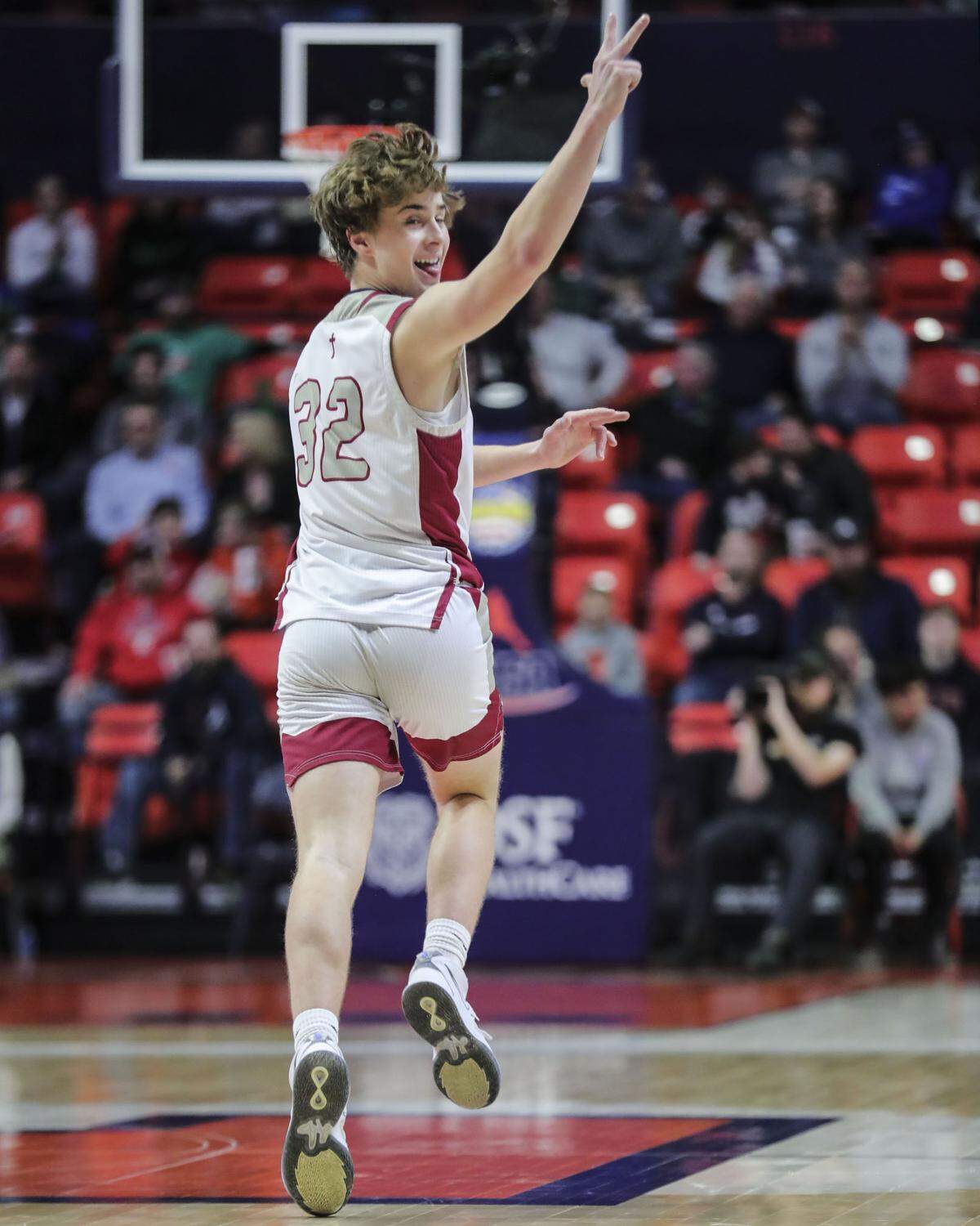 Gibault’s Gavin Kesler after hitting a shot during Saturday’s IHSA Class 1A state championship game against Scales Mounds at the State Farm Center on the campus of the University of Illinois. Gibault ultimately prevailed 65-45 to claim the state title.