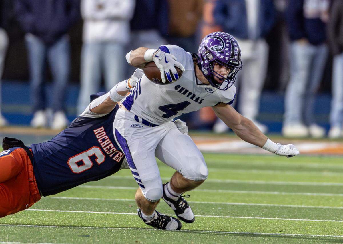 Breese Central senior running back Cole Davis fights for yards against Rochster in an IHSA Class 4A state semifinal Saturday.