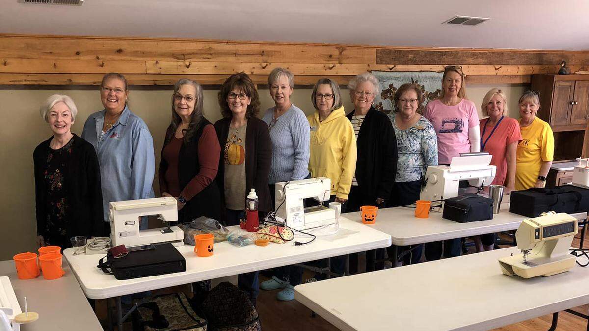 Two members of O’Fallon’s Looking Glass Prairie Chapter, National Society Daughters of the American Revolution joined other Daughters from around the country in a once in a lifetime experience. Sisters Suzie Haas and Rhonda Leach were members of a 13-member DAR team from six states who gathered in Nicholasville, Kentucky, to assemble an America 250! quilt top. The quilt top, made up of 8-inch squares from each state, honors the upcoming United States 250th anniversary: the semiquincentennial, in 2026. DAR National Chair Kim Zeman said the quilt represents our country’s wonderful and diverse states which together form our inseparable union. Both Haas and Leach are experienced quilters admitting they learned the craft when they were young from their skilled grandmothers. Pictured: Team members who worked on the quilt. Hass is fifth from the left; Leach is sixth from the left. Submitted by Lola DeGroff