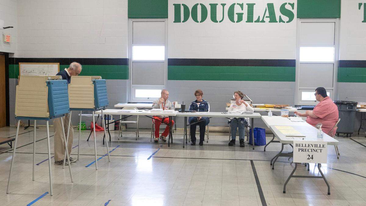 In this 2023 file photo, election judges at the Douglas Elementary School polling location in Belleville wait for their next voter in the last election.