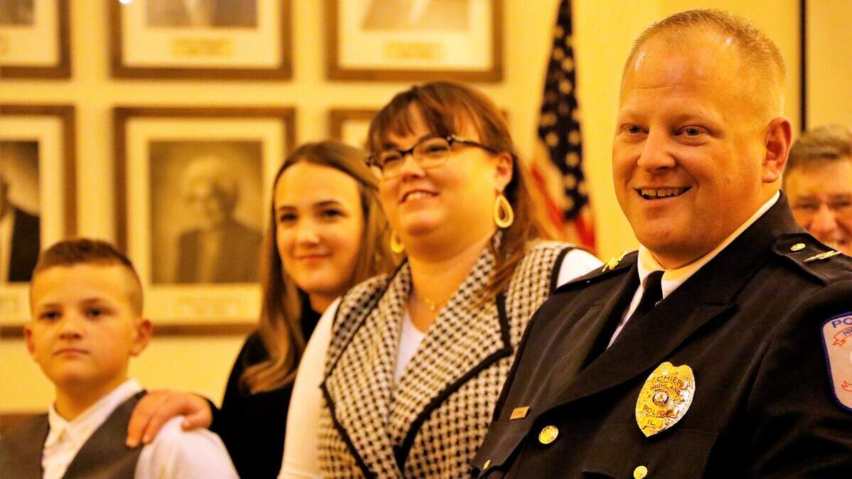 Highland Police Chief Chris Conrad speaks after being sworn in Monday, Nov. 19. Conrad said he hopes to follow in the footsteps his predecessor and mentor Terry Bell, who lost his battle with cancer in August.