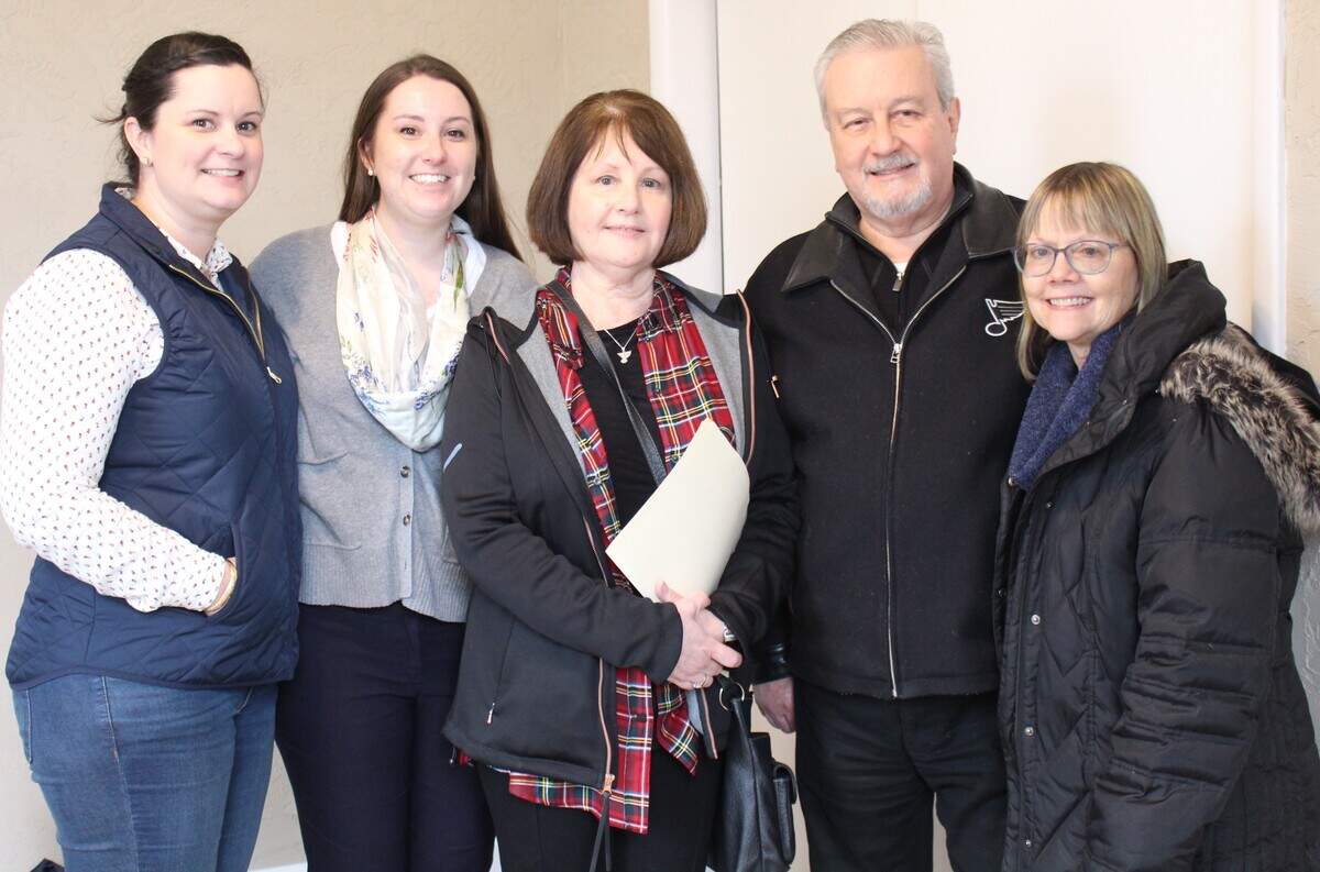Calhoun family members at the ribbon-cutting include, left to right, Lauren Heffernan, Lindsay Heffernan, Bonnie Heffernan, Tom Calhoun and Barb Calhoun. Tom is the public-address announcer for the St. Louis Blues.