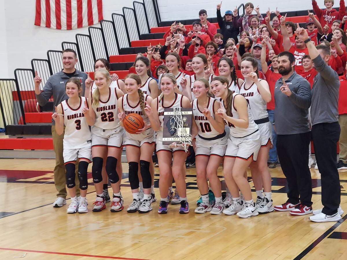 The 2022-23 Highland Lady Bulldogs celebrate their IHSA Class 3A regional championship Friday, Feb. 17, at Highland High School. HHS defeated Mississippi Valley Conference rival Waterloo 52-49 for the title.