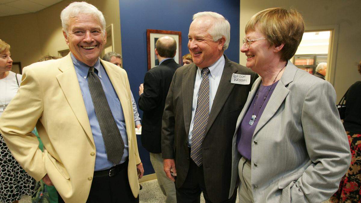 In this 2007 file photo, attorney Bruce N. Cook, left to right, attorney Gordon Broom and Land of Lincoln Legal Aid Executive Director Lois Wood chat during an open house for the new Dorothy O. Cook Community Law Center, which still houses Land of Lincoln’s East St. Louis branch.