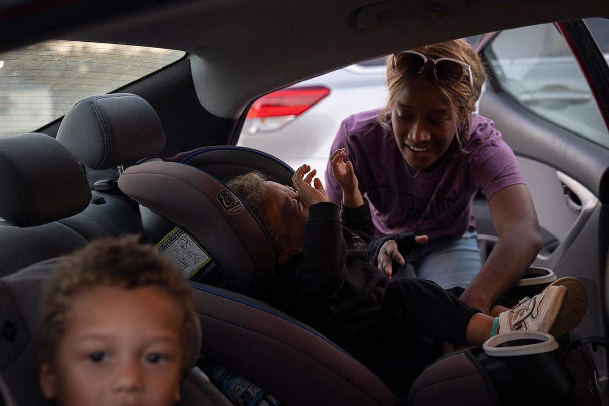 Wilson picks up her younger son, Royce Lingle, from OWL.