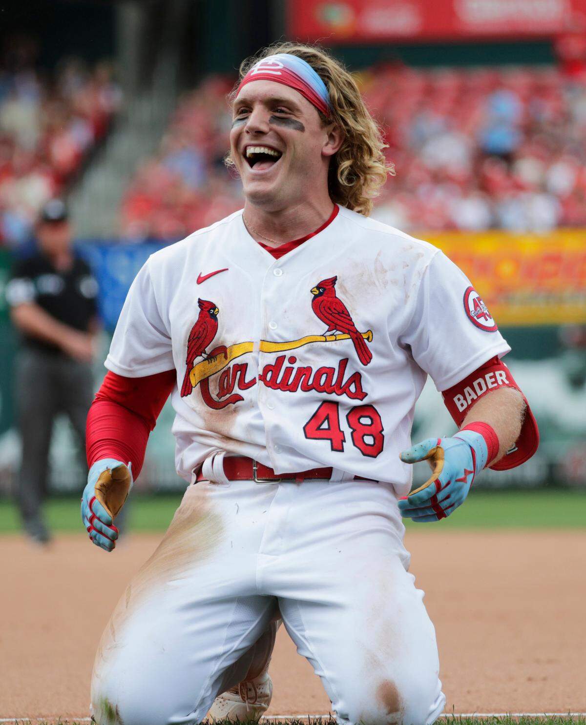St. Louis Cardinals’ Harrison Bader (48) celebrates after beating out an infield RBI-single in the seventh inning of a baseball game against the San Francisco Giants, Sunday, July 18, 2021, in St. Louis. (AP Photo/Tom Gannam)